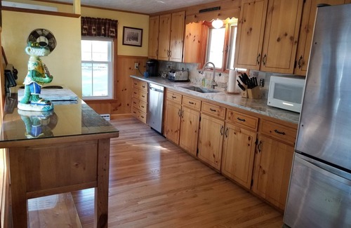 North Sebago House | Lakefront Retreat with 5 Bedrooms and Sandy Beach Access