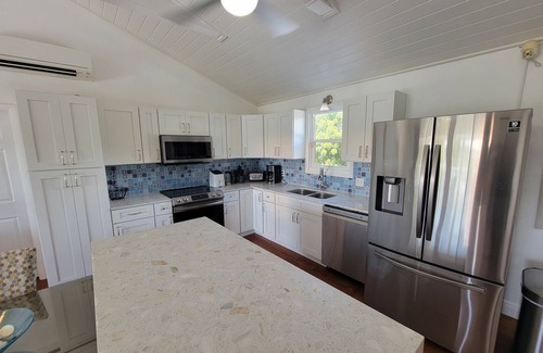 Discovery Bay Villa | Family-Friendly Canal Retreat with Pool and Ocean Views