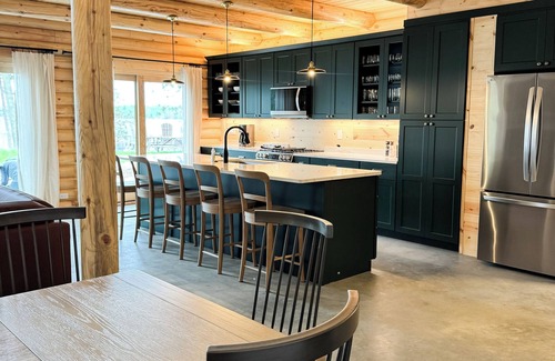 Cook Cabin | 5-bed 5.5 bath cabin on LAKE VERMILION with AC, WiFi, Beach, Sauna, Pickle Ball