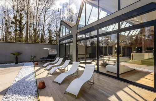 Seine-et-Marne House | Experience Relaxation with Indoor Pool and Spa Retreat