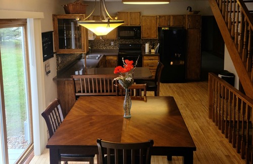 Waupaca House | Inviting 5 Bedroom Retreat on Waupaca River with Hot Tub