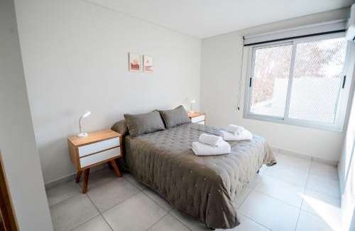 Dorrego Apartment | Top-Rated Centro Duplex: Family & Pet Friendly Abode!