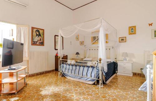 Lizzanello Apartment | Domus Antiqua: Relaxing Spa Retreat with Family Fun