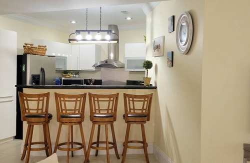 Bahamia West Condo | Gated Condo with Boat Dock, Pool & Ocean View Awaits