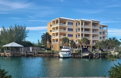 Bahamia West Condo | Gated Condo with Boat Dock, Pool & Ocean View Awaits