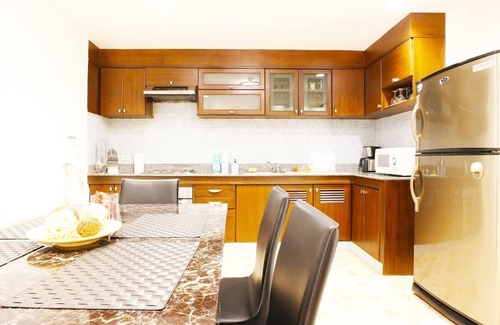 Thung Maha Mek Apartment | Convenient 2-BR Getaway, Steps from BTS with Breakfast