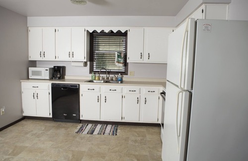 Ashwaubenon House | Prime Location: Steps from Lambeau Field with Family Amenities