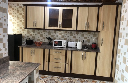 Bukoto Apartment | Convenient Family Condo with Balcony Near Recreation Center