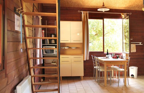 Porte de Dromardeche Ski Chalet | 5 riverfront chalets with swimming pool