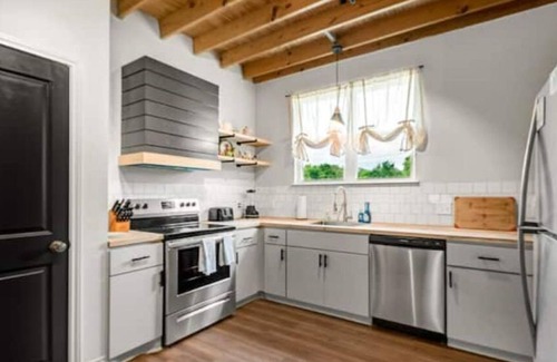 Downtown Apartment | Top-Rated 2BR Escape: Superhost Service & Family Amenities