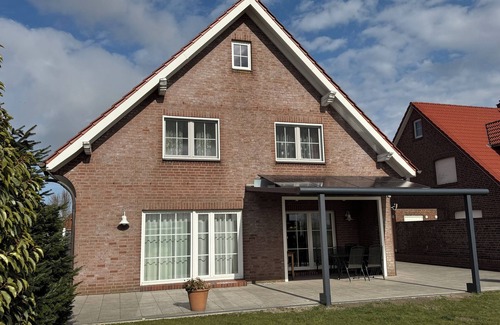 Westeraccumersiel House | Experience a 5-Star Holiday Home with Sauna & Ocean Views
