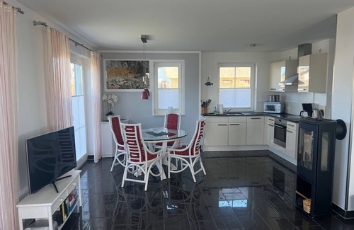 Dranske Condo | Exclusive 5-Star Apartment Steps from the Beach with Free Wi-Fi