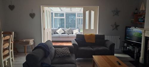 Kilkee House | Discover The Cloisters Kilkee: Beachfront Family Retreat