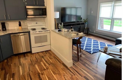 Green Bay Apartment | Cozy Comfort at The Hockey Haven: Ritchie’s Titletown Suites