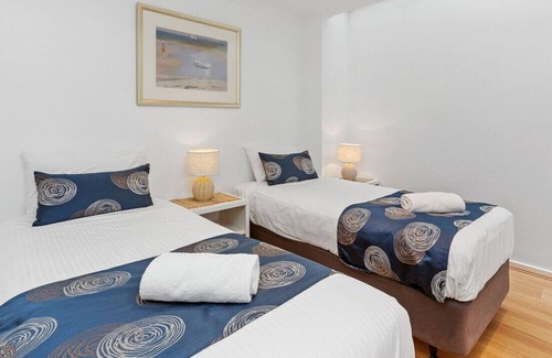 Wongarra Apartment | Whitecrest Resort: Poolside Retreat with Ocean Views