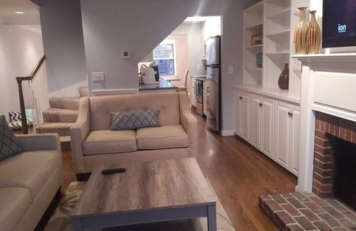 Portsmouth House | Ocean Bay View Townhouse with Fireplace and Family Amenities