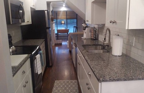 Portsmouth House | Ocean Bay View Townhouse with Fireplace and Family Amenities
