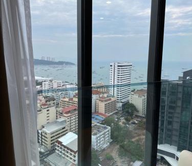 Pattaya Bay Apartment | Oceanfront Retreat: 502 Edge in Pattaya with Pool & Beach Access