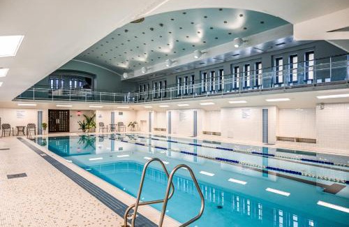 Gateway District Apartment | Discover 506: Pool & Steam Retreat in Playhouse Square