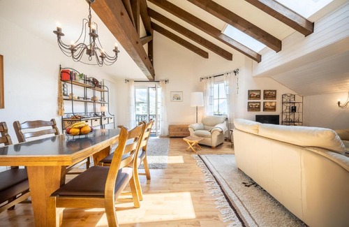 Vulpera Apartment | Modern Penthouse with Balcony and Child-Friendly Amenities