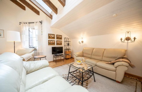 Vulpera Apartment | Modern Penthouse with Balcony and Child-Friendly Amenities