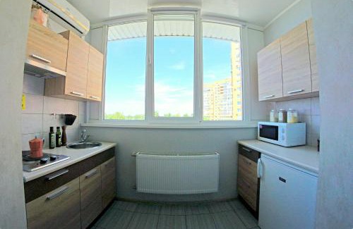 Dzerzhyns'kyi District Apartment | Discover 54a Tselinogradskaia Str: Pet-Friendly Retreat