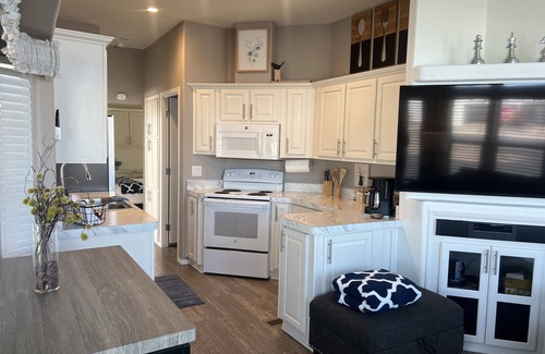 Florence House | Relax at Little Pueblo Del Sol with Pool and Spa Amenities