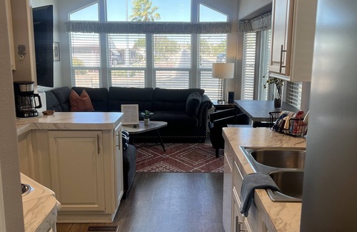Florence House | Relax at Little Pueblo Del Sol with Pool and Spa Amenities