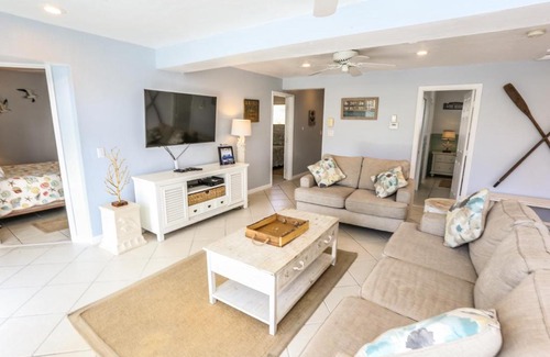 Mid Island House | Relax at 5570 Palmetto Street: Pet-Friendly & Poolside Retreat
