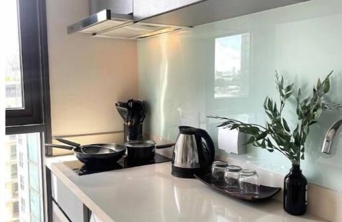 Sukhumvit Apartment | Convenient Stay with City Views and Full Kitchen Access