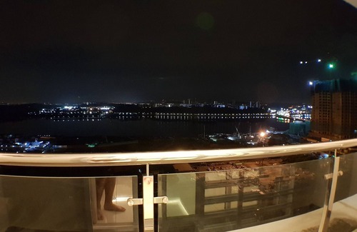 Central District Condo | Perfect Getaway: Balcony Views Near CIQ & CitySquare