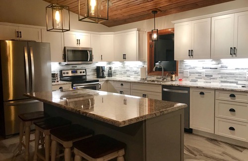 Paw Paw House | Ideal 6 Bedroom House on Lake Cora with Hot Tub & Dock