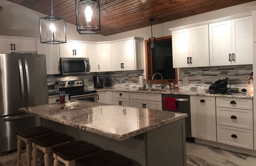 Paw Paw House | Ideal 6 Bedroom House on Lake Cora with Hot Tub & Dock