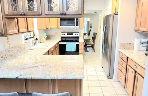 Greater Northdale House | Ideal Tampa Retreat: Pool, Grill & Billiards Await You