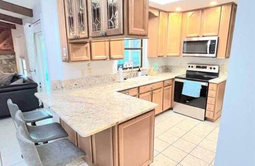 Greater Northdale House | Ideal Tampa Retreat: Pool, Grill & Billiards Await You