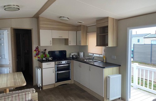 Felixstowe House | 6 berth caravan with side decking at Suffolk Sands Holiday Park ref 45054C