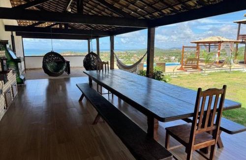 Sao Pedro da Aldeia Apartment | Relaxing Suites with Pool & Fireplace in Região dos Lagos