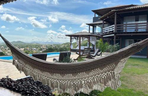 Sao Pedro da Aldeia Apartment | Relaxing Suites with Pool & Fireplace in Região dos Lagos