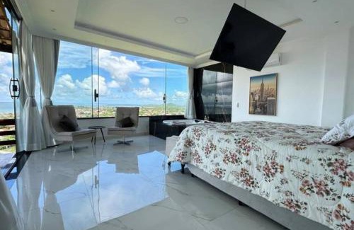 Sao Pedro da Aldeia Apartment | Relaxing Suites with Pool & Fireplace in Região dos Lagos