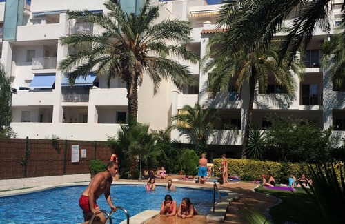 Santa Margarida Apartment | Inviting Oceanfront Apartment with Large Terrace and Pool