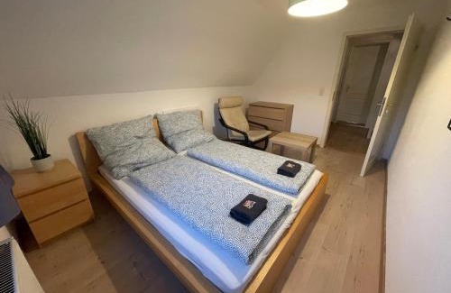 Memmingen House | Comfortable Doppelzimmer with Shared Bath & Family Amenities