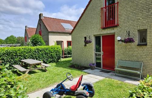 Ewijk House | Family-Friendly Retreat with Firepit, Garden & Swimming Lake