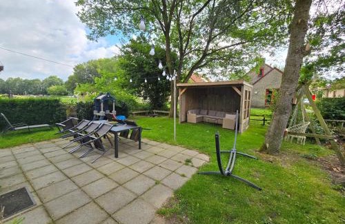Ewijk House | Family-Friendly Retreat with Firepit, Garden & Swimming Lake