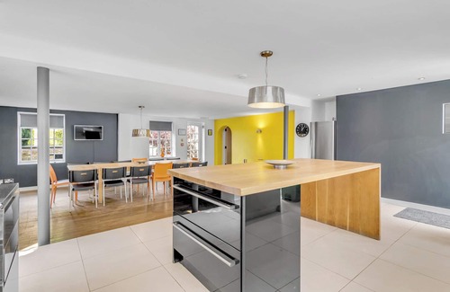 Stoke Ferry House | Pet-Friendly 7 Storey Windmill with Pool & BBQ Amenities