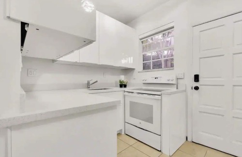 Northeast Coconut Grove House | Spacious 7BR Oasis: Pool, Hot Tub & Ocean View Retreat