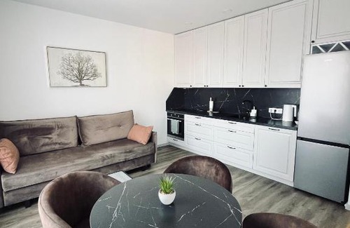 Klaipeda Apartment | Top-Rated 7th Floor Apartment with Free Parking for Families