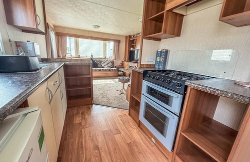 Louth House | Spacious 8 Berth Caravan with Decking at Sunnydale, Lincolnshire