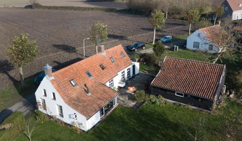 Sint Anna ter Muiden House | Relax at 8 Jonkvrouw Geilstraat: Pet & Child-Friendly Stay