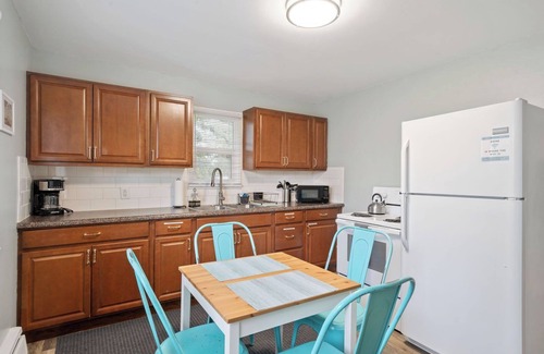 Cheyenne House | Spacious 4-Bedroom Duplex with Hot Tub & 2 Kitchens