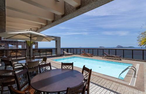 Ipanema Apartment | Oceanfront Escape: Ipanema Beach with Pool & Restaurant